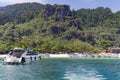 Boats and catamarans near entrance to a lagoon in tropical Koh Hong island is famous tour in Andaman sea