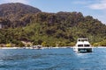 Boats and catamarans near entrance to a lagoon in tropical Koh Hong island is famous tour in Andaman sea