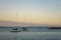 Boats close to a Danish harbour with a striking sunset