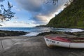 Boats and coast at Anse des Cascades near Sainte Rose city, Reunion Island