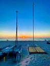 Boats coastline sand sunset Naples Florida Royalty Free Stock Photo