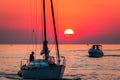 Boats coming into harbor at sunset Royalty Free Stock Photo