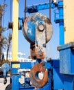 Boats crane hook pulley detail on marina