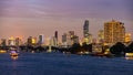 Boats cruising on the Chao Praya River at Bangkok, Thailand.