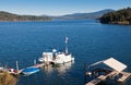 Boats Docked on a Blue Lake Royalty Free Stock Photo