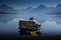 Boats docked on a calm blue mountain lake