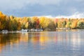 Boats docked on Lake Lovering seen during a sunny fall afternoon with grey sky in the background Royalty Free Stock Photo