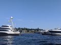 Boats docked on Lake Washington on a bright, sunny day