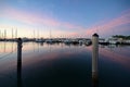 Boats docked in marina in Miami, Florida at sunrise.