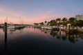 Boats docked in marina in Miami, Florida at sunrise.