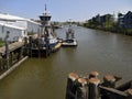 Boats docked on the Petaluma River Royalty Free Stock Photo