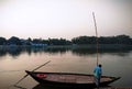 Boats docked by the shore of river ganga