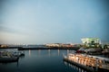 Boats are docking in Yokohama Port at night.