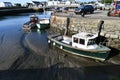 Boats on dry land due to a severe drought and the receding tide