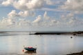 Boats in the Estuary of the river Mawddach, Barmouth, Wales, County of Gwynedd on a cloudy autumn afternoon