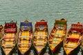 Boats floating on water in a lake in hill station Bhimtal in Nainital district of India Royalty Free Stock Photo