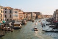 Boats, gondolas and water taxis navigating through Grand Canal and the buildings from Rialto bridge in Venice, Italy Royalty Free Stock Photo