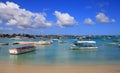 Boats at Grand-baie beach in Mauritius