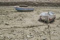 Boats on ground during tide Royalty Free Stock Photo