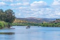 Boats at Guadina river viewed from Portuguese town Alcoutim Royalty Free Stock Photo