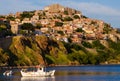 Boats in the harbor with castle on the hill at Molyvos Greece Royalty Free Stock Photo