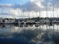 Boats in a harbor mirrored on water surface Royalty Free Stock Photo