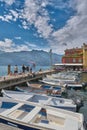 Boats in the harbor of the popular italian town of Malcesine on Lake Garda Royalty Free Stock Photo