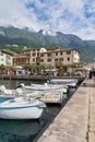 Boats in the harbor of the popular italian town of Malcesine on Lake Garda Royalty Free Stock Photo