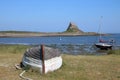 Boats, harbour, Lindisfarne Castle on Holy Island Royalty Free Stock Photo