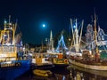 Boats in harbour at night during event Admiralty Days in old town of Dokkum, Friesland, Netherlands Royalty Free Stock Photo
