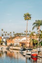 Boats and houses along a canal in Naples, Long Beach, California Royalty Free Stock Photo