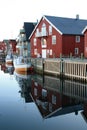 Boats and houses of Hennigsvaer's Canal Grande Royalty Free Stock Photo