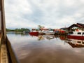 Boats at the Jetty in Merang, Terengganu, Malaysia. Viewed from the moving boat