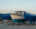 Boats on land waiting for the summer to arrive.. Royalty Free Stock Photo