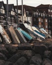 Boats leaning against a beach wall