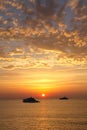 Boats in the Ligurian sea at sunrise Royalty Free Stock Photo