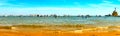 Boats lined up near the shore juxtaposed with each other to eat together at Punta Sabbioni. Royalty Free Stock Photo