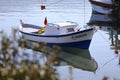 the boats of the local people who make their living by fishing are waiting to go hunting in the still sea.