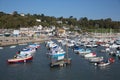 Boats in Lyme Regis harbour Dorset England UK with boats on a beautiful calm still day on the English Jurassic Coast Royalty Free Stock Photo