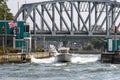 Boats making their way through the rough waters of the open locks in the Shinnecock Canal