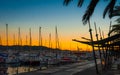 Boats in marina harbor at the end of a warm sunny day in Ibiza, St Antoni de Portmany Balearic Islands, Spain Royalty Free Stock Photo