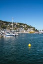 Boats and marina in L`Estartit city on the Costa Brava under blu Royalty Free Stock Photo