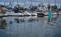 Boats in the marina and reflections in the water Royalty Free Stock Photo