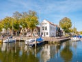 Boats in marina of small harbour in old town of Middelharnis on Goeree-Overflakkee, Zuid-Holland, Netherlands Royalty Free Stock Photo