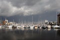 Boats in a marina with stormy sky Royalty Free Stock Photo