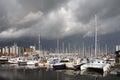 Boats in a marina, stormy sky Royalty Free Stock Photo