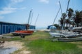Boats on a Meadow by a Turquoise Sea in Walvisbay, Namibia Royalty Free Stock Photo