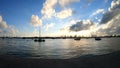 Boats by Miami Beach bay walk at sunset. Florida