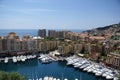 Luxury Yachts and Waterfront Apartments in Monaco Harbor Royalty Free Stock Photo
