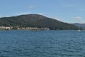 Boats Moored Along With Mussel Breeders In The Estuary Of The Muros Village. Nature, Architecture, History, Street Photography. Royalty Free Stock Photo